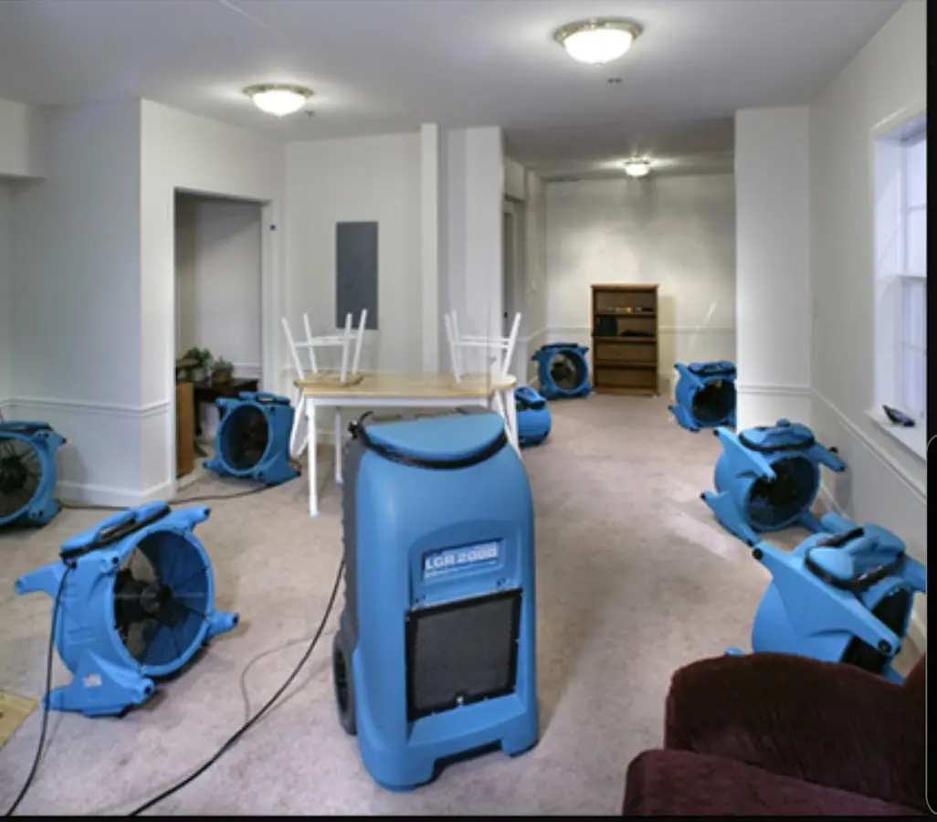 Air movers and dehumidifier setup for Water Damage Restoration in North Greenbush